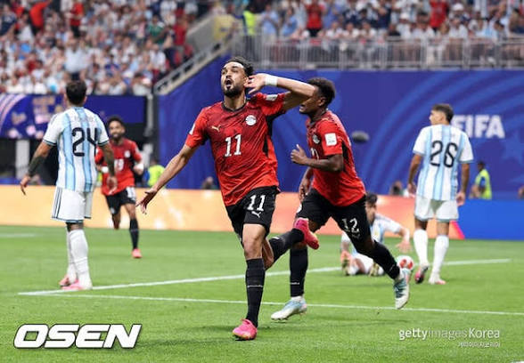 Massive Upset at the World Cup: <span style="background-color:#fff9c4;font-weight:bold;">Egypt</span> Knocks Out Defending Champion Argentina.